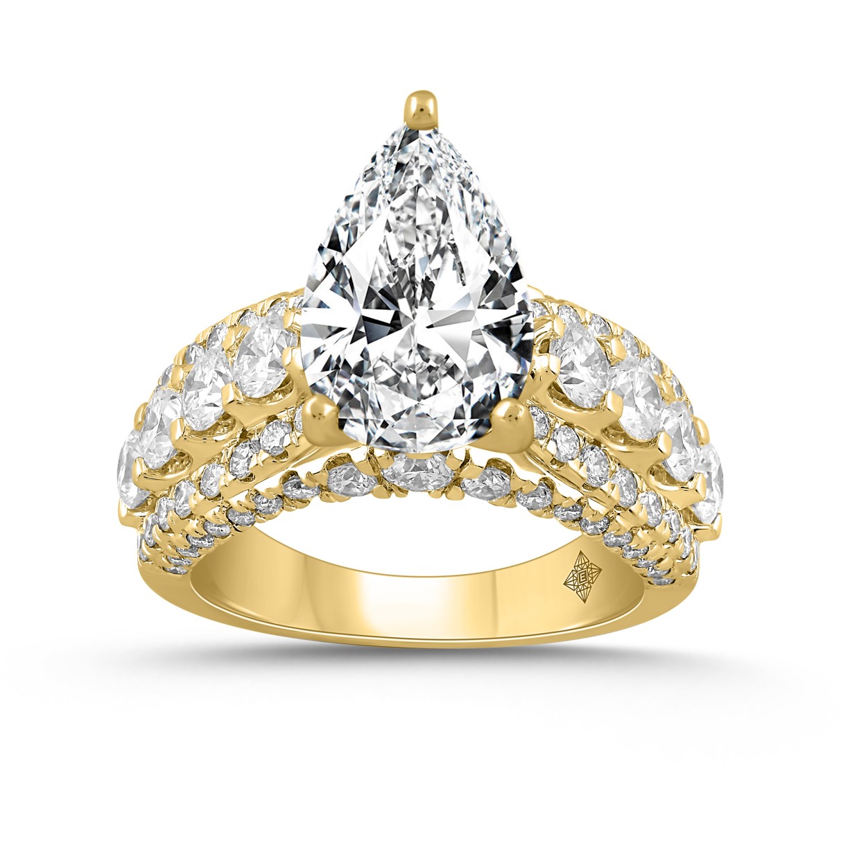 LADIES RING 5 1/4CT ROUND/ PEAR DIAMOND 14K YELLOW GOLD (CENTER STONE PEAR DIAMOND 3CT )