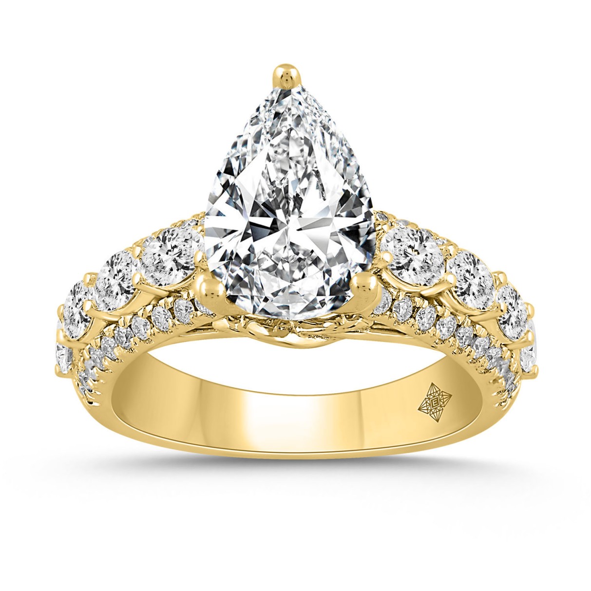 LADIES RING 4 1/4CT ROUND/PEAR/OVAL DIAMOND 14K YELLOW GOLD (CENTER STONE PEAR DIAMOND 3CT )